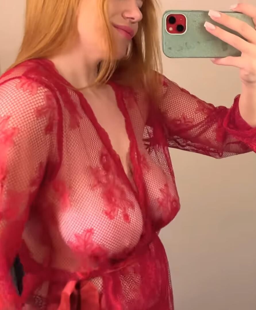 Redhead see through top big tits