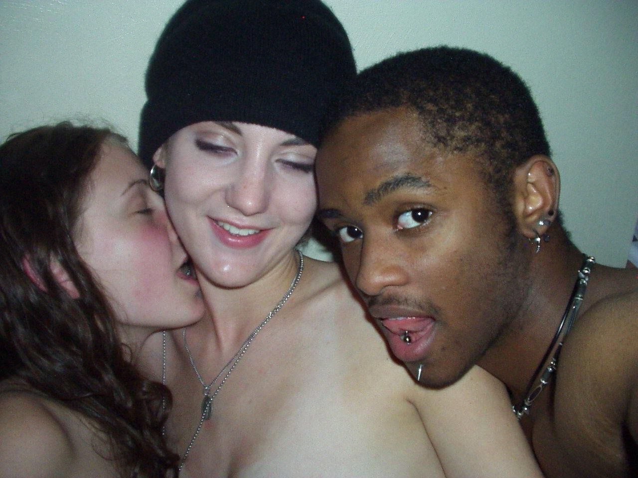 Erika and boyfriend with girl in black woolly hat