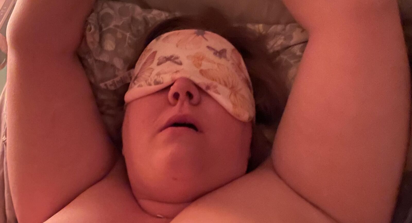 Wife. Face and hints of more. 