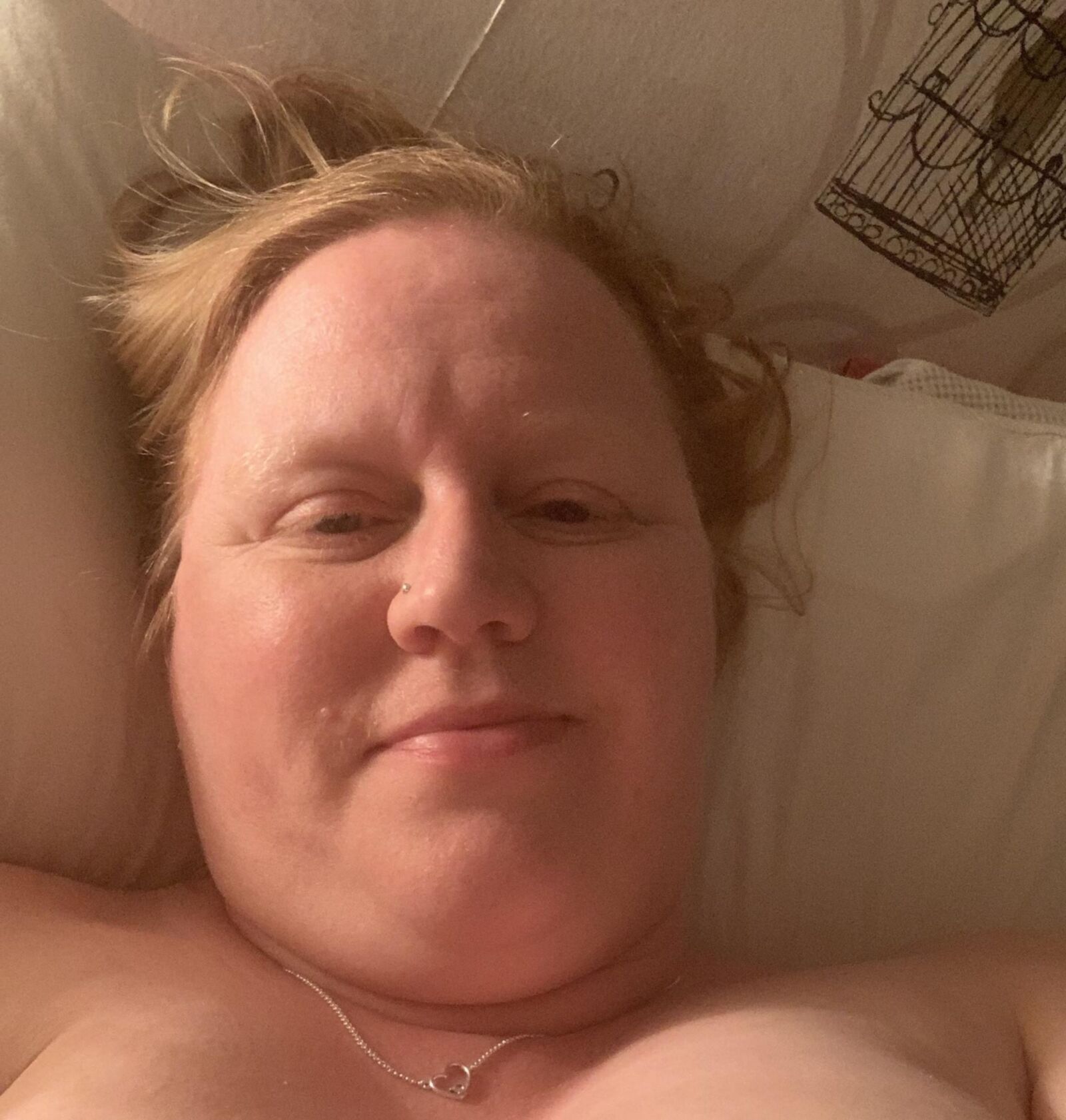 Wife. Face and hints of more. 