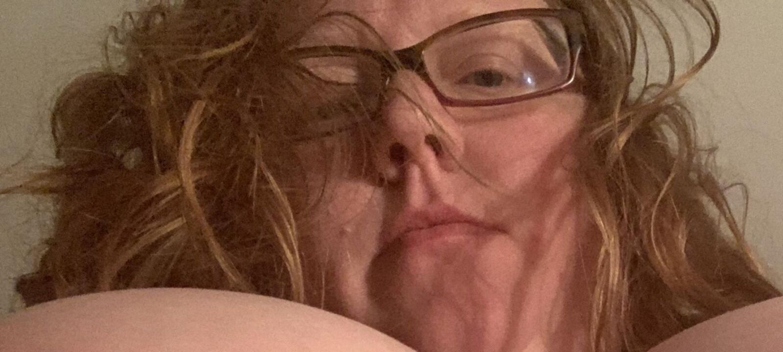 Wife. Face and hints of more. 