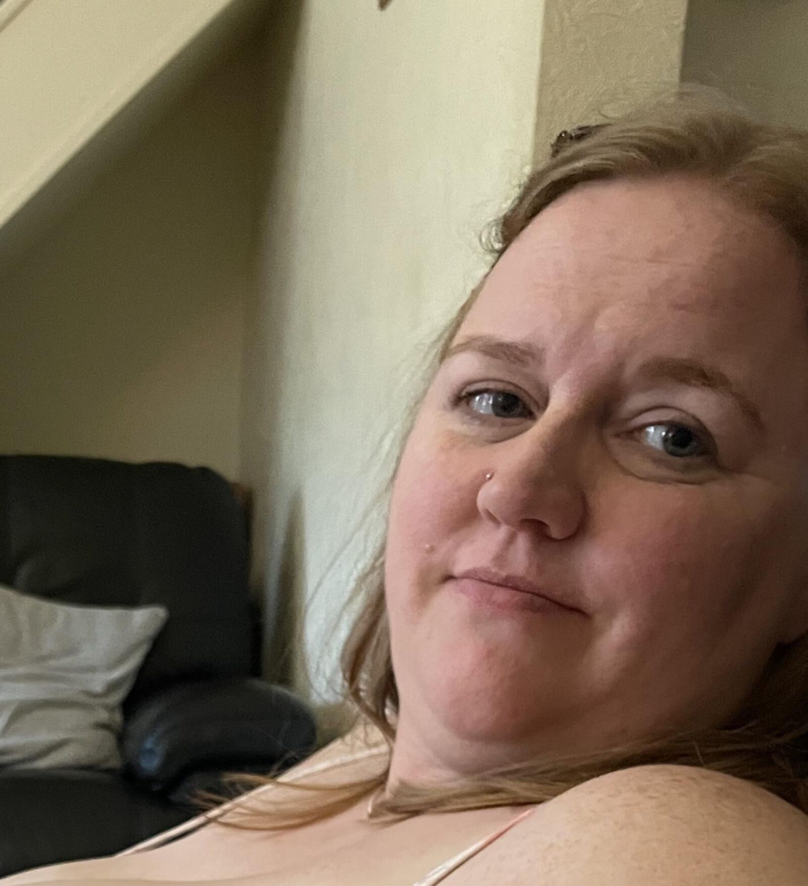 Wife. Face and hints of more. 
