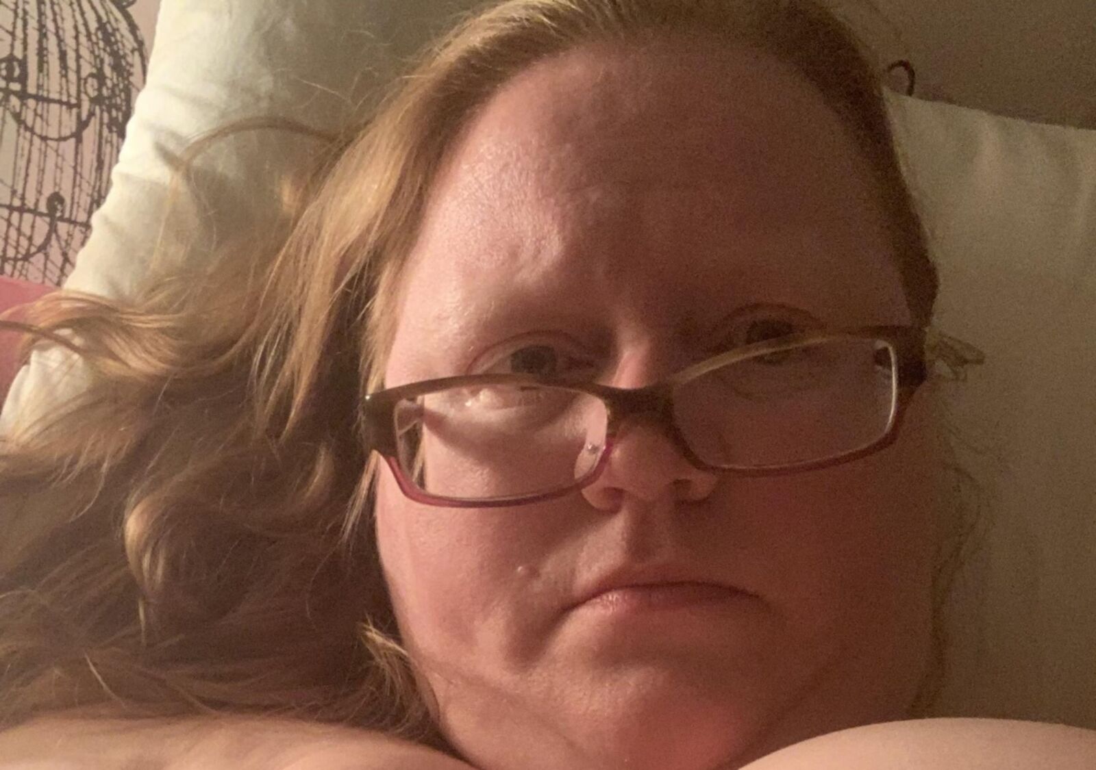Wife. Face and hints of more. 