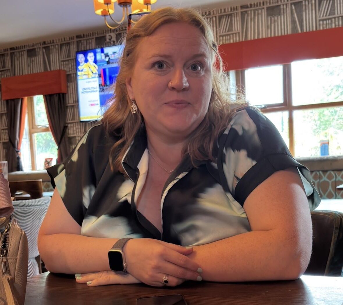 Wife. Face and hints of more. 